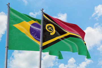 Vanuatu and Brazil flags waving in the wind against white cloudy blue sky together. Diplomacy concept, international relations.