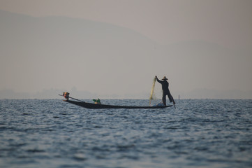 The famous fishermen of Inle Lake, Myanma, working at sunrise