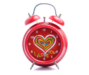 Red alarm clock,  white background