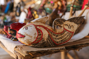 Wooden figurines souvenirs in the market of Myanmar