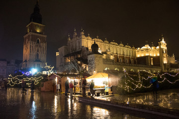 Fantastic view of the night winter KRAKOW. Nightly European Christmas cityscapes.