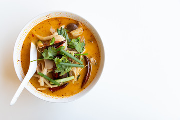 Tom Yum mushroom in bowl on white table background