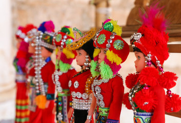 A lot of bright souvenirs on the counter of the ancient souvenir market in Myanmar