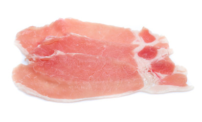 Raw pork meat with parsley herb leaves isolated on white background