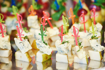 Catering service. snack at food court table during event
