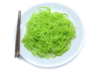 green noodles on dish isolated on white background