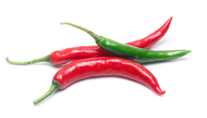 red and green chili pepper on white background