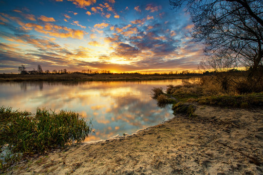 Beautiful Sunrise Over River Banks