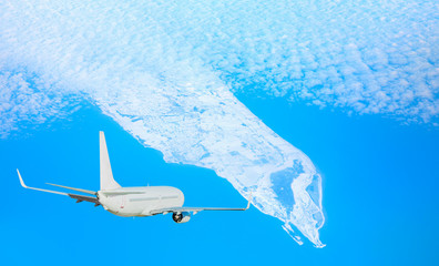 White passenger airplane in the clouds - Passenger plane trying to land on an icy runway