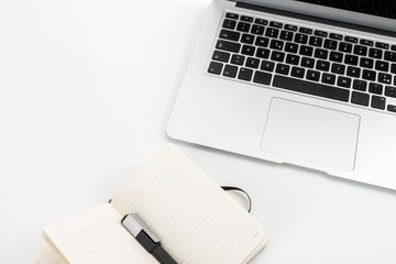 Notes and laptop on the desk