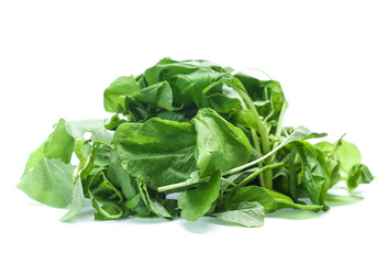 Spinach leaves close up isolated on white