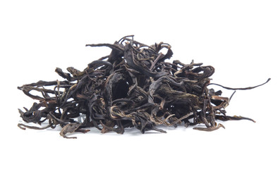 Dry tea leaves isolated on white background.top view