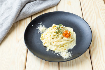 Homemade Pasta with Cheese on the Wooden Background, Healthy Food, Free Space for Text