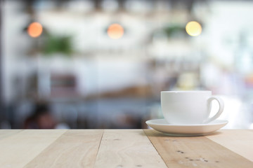 Hot Coffee cup  on the wooden table