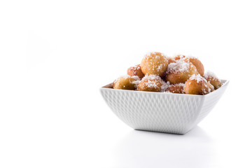 Carnival fritters or buñuelos de viento for holy week isolated on white background.Copy space