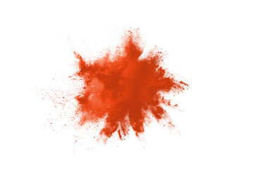abstract orange powder splatted background. Colorful powder explosion on white background. Colored cloud. Colorful dust explode. Paint Holi.