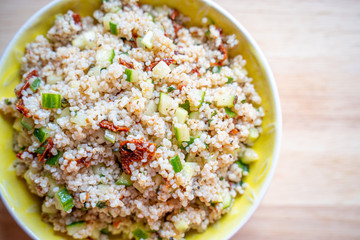 Healthy Salad with Barley, Sun Dried Tomatoes, Cucumber, Lemon Juice, Olive Oil and Herbs