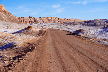 Dirt road in the Moon valley in Atacama desert near San Pedro de Atacama, Chile.