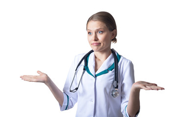 Portrait of female surprised doctor posing on white