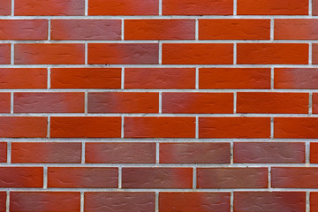 Background of red brick wall pattern texture. Great for graffiti inscriptions.