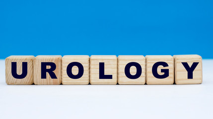 concept word urology on cubes on a blue background