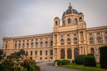 Fototapeta na wymiar Beautiful view of famous Naturhistorisches Museum (Natural History Museum) with park and sculpture in Vienna, Austria