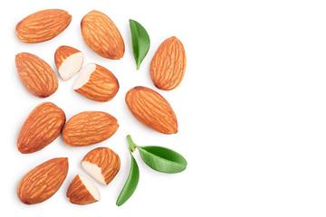 Almonds nuts with leaves isolated on white background with clipping path and full depth of field. Top view with copy space for your text. Flat lay
