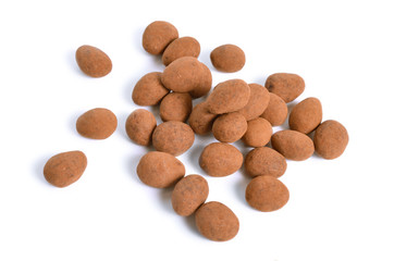 Sweets with almonds and cocoa powder. Isolated On white background