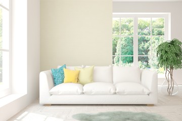 Stylish room in white color with sofa and summer landscape in window. Scandinavian interior design. 3D illustration
