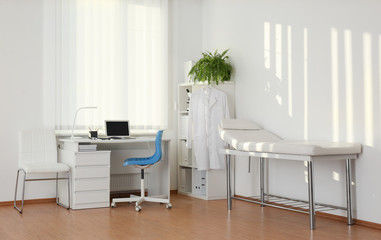 Interior of modern medical office with doctor's workplace