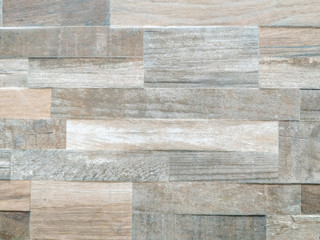 Cool and modern tiles looking like stone bricks in beige color with rough and uneven texture on surface for home decoration style