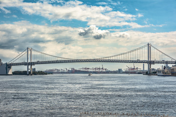 View of the Rainbow Bridge in Tokyo, Japan