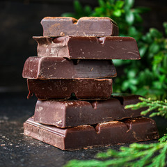 chocolate (delicious cocoa dessert, pieces ofbackground. top view. copy space sweets) menu concept. food 