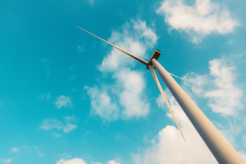 Fototapeta premium Wind Turbine in Wind farm with the blue sky for future energy