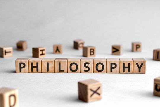 Philosophy - words from wooden blocks with letters, love of wisdom philosophy concept, white background