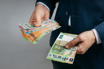 Businessman counts real euro money in hands - obrazy, fototapety, plakaty