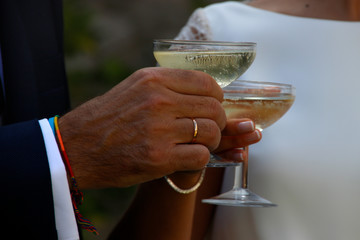 Bride and groom toasting with champagne