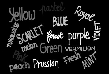 Nomi di colori scritti in bianco su lavagna nera