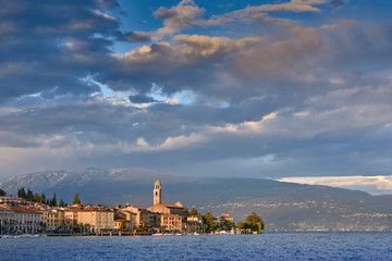 Little Harbour near Brescia. Colorful fisherman's boats and yachts in the harbour of lago di Garda, northern Italy. .