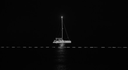Yacht docked in the marina, night view