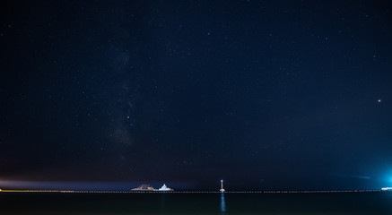 Yacht docked in the marina, night view stars in Montenegro