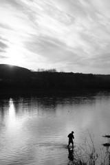 fisherman on the lake