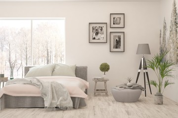 Stylish bedroom in white color with winter landscape in window. Scandinavian interior design. 3D illustration