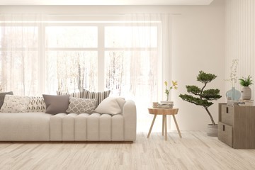 Stylish room in white color with sofa and winter landscape in window. Scandinavian interior design. 3D illustration