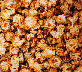 top view sweet caramelized candied popcorn in a white box