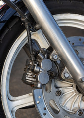 Heavy motorcycle wheel with disc brakes closeup