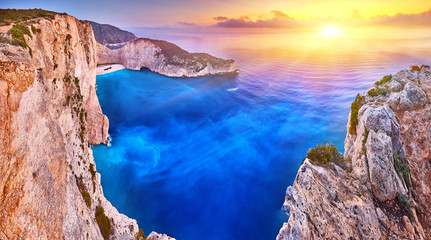 Navagio Beach with shipwreck view on Zakynthos island, Greece. Incredibly romantic sunrise on...