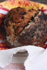 Fresh bread with black sesame and raisins