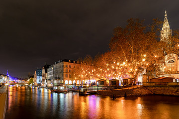 View of Strasbourg with Christmas Markets at night, Alsace region, France