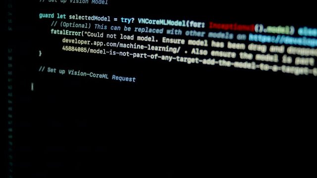 4.1 Developer type artificial Intelligence application with core machine learning on swift programming language on laptop screen
